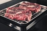 découvrez notre support pour friteuse à air, idéal pour cuire plusieurs aliments simultanément et optimiser l'espace dans votre appareil.